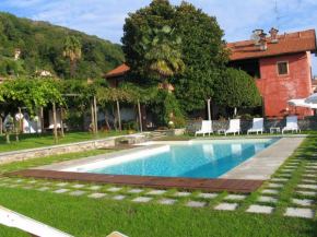  2 bedrooms appartement with lake view shared pool and enclosed garden at Massino Visconti 3 km away from the beach  Массино Висконти